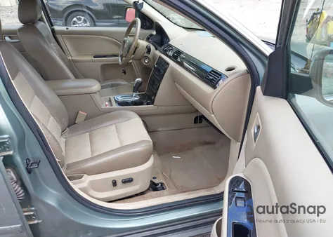 2005 Mercury Montego Premier из США, поврежденный, VIN 1MEHM42175G609250